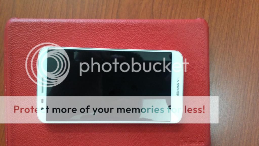 ra đi pé G2 docomo white fullbox